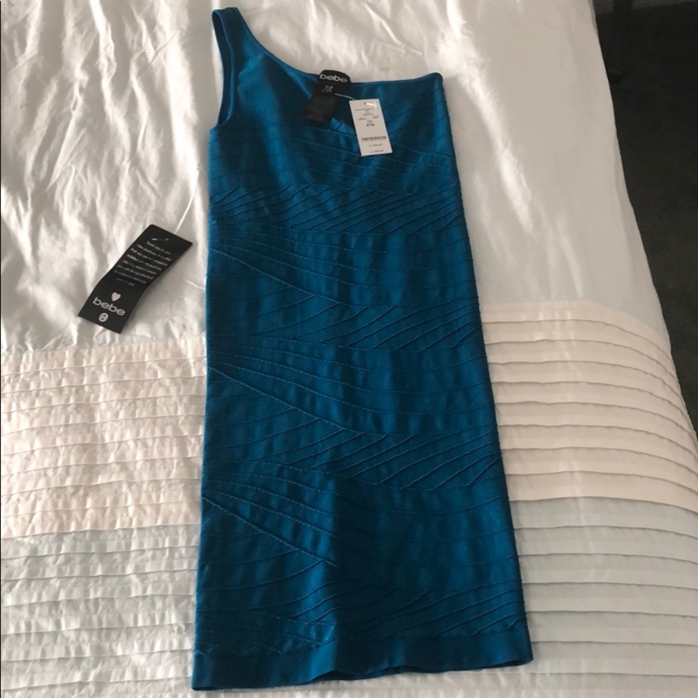 Teal Bebe  “bandage” style dress NWT